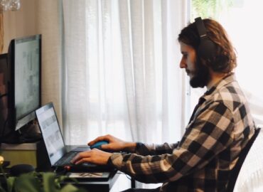 Man using Computer PC in a home office