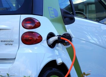 electric car being charged from the back