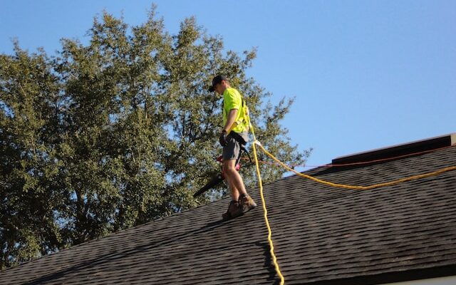 man roofing